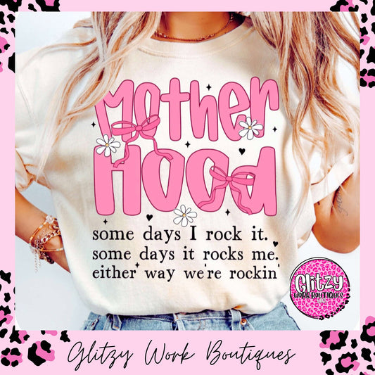 MOTHERHOOD SOME DAY I ROCK IT. SOME DAYS IT ROCKS ME. EITHER WAY WE'RE ROCKIN' COQUETTE BOW PRINTED APPAREL
