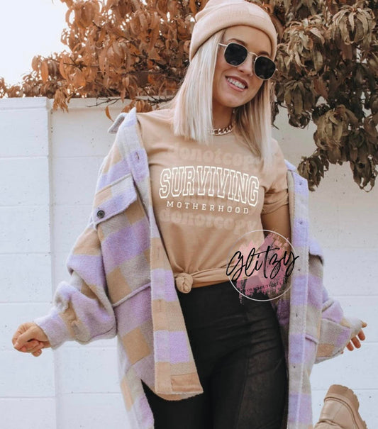 SURVIVING MOTHERHOOD Graphic Tee