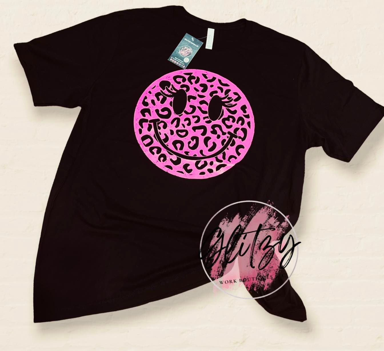 Hot Pink Smiley Face with Lashes Black Graphic Tee